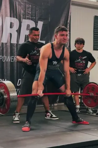 Athlete setting up for a deadlift on the CRPL platform