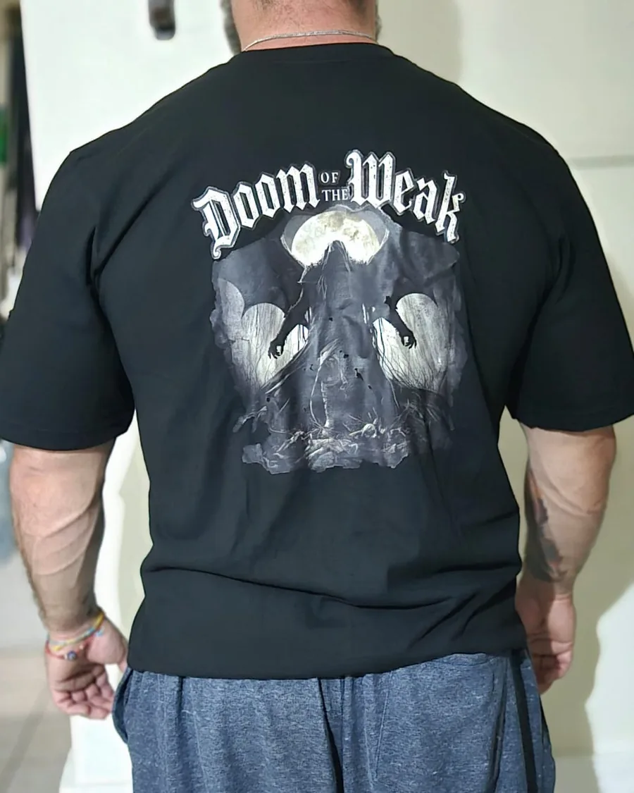 The black Doom of the Weak gothic t-shirt worn, back print